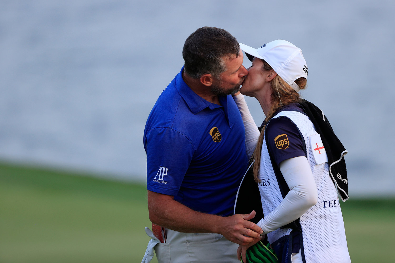 PONTE VEDRA BEACH, FLORIDA - MARCH 13: Lee Westwood of England kisses his caddie and partner Helen Storey after finishing on the 18th green during the third round of THE PLAYERS Championship on THE PLAYERS Stadium Course at TPC Sawgrass on March 13, 2021 in Ponte Vedra Beach, Florida. (Photo by Sam Greenwood/Getty Images)