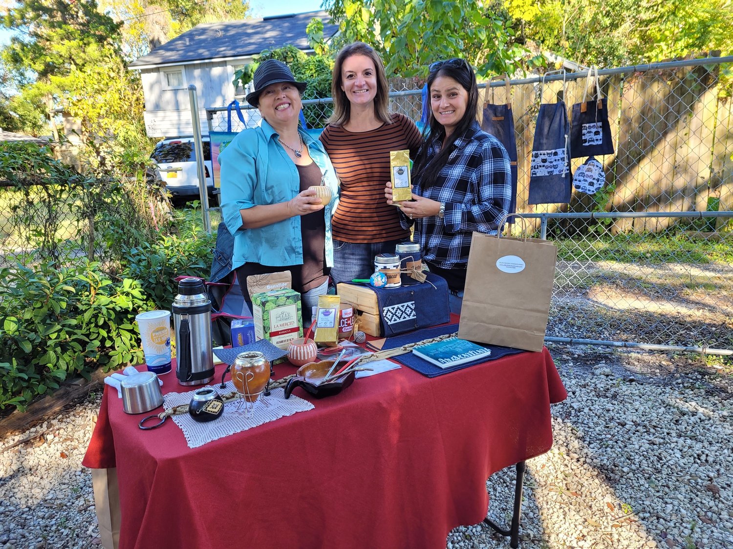 Dr. Carla Rodrigues, second from left, and vendors at the Artisans Market fundraiser for Celestial Farms.