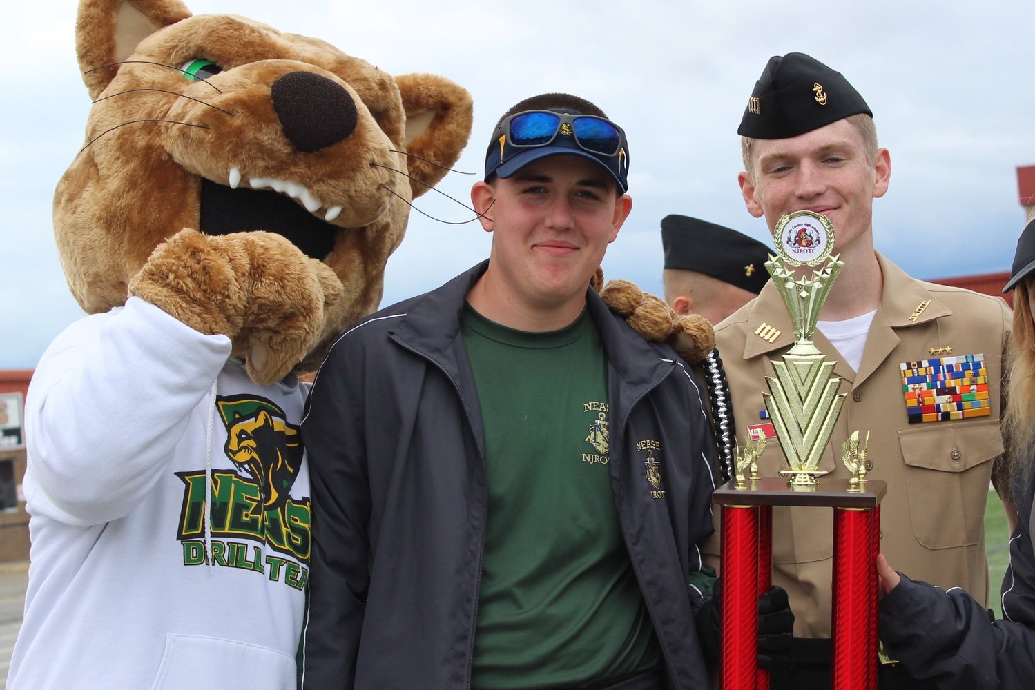 Cadet Ensign Ben Prohofsky accepts the first-place team academics trophy at the Lee County drill meet on Oct. 30. Prohofsky claimed top academic honors at two of the three competitions.