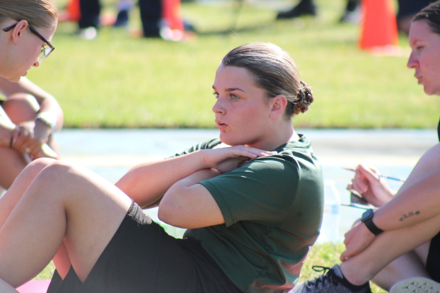 Nease NJROTC cadet Emmelie Neff performs one of her 315 total sit-ups to place second individually at the 2022 Navy National Academic, Athletic and Drill Championships in Pensacola on April 1.