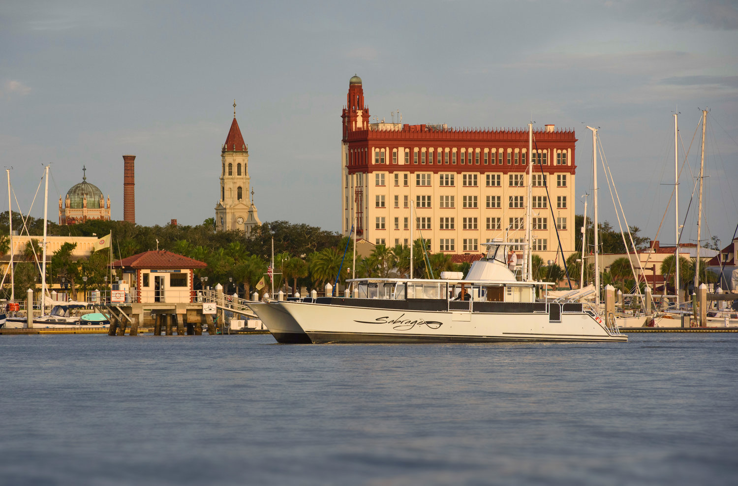 Sabrage is seen on St. Augustine’s bayfront, with the city in the background.