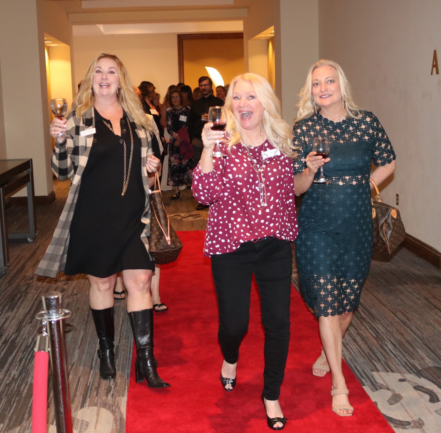 Attendees followed a red carpet to the dining room.