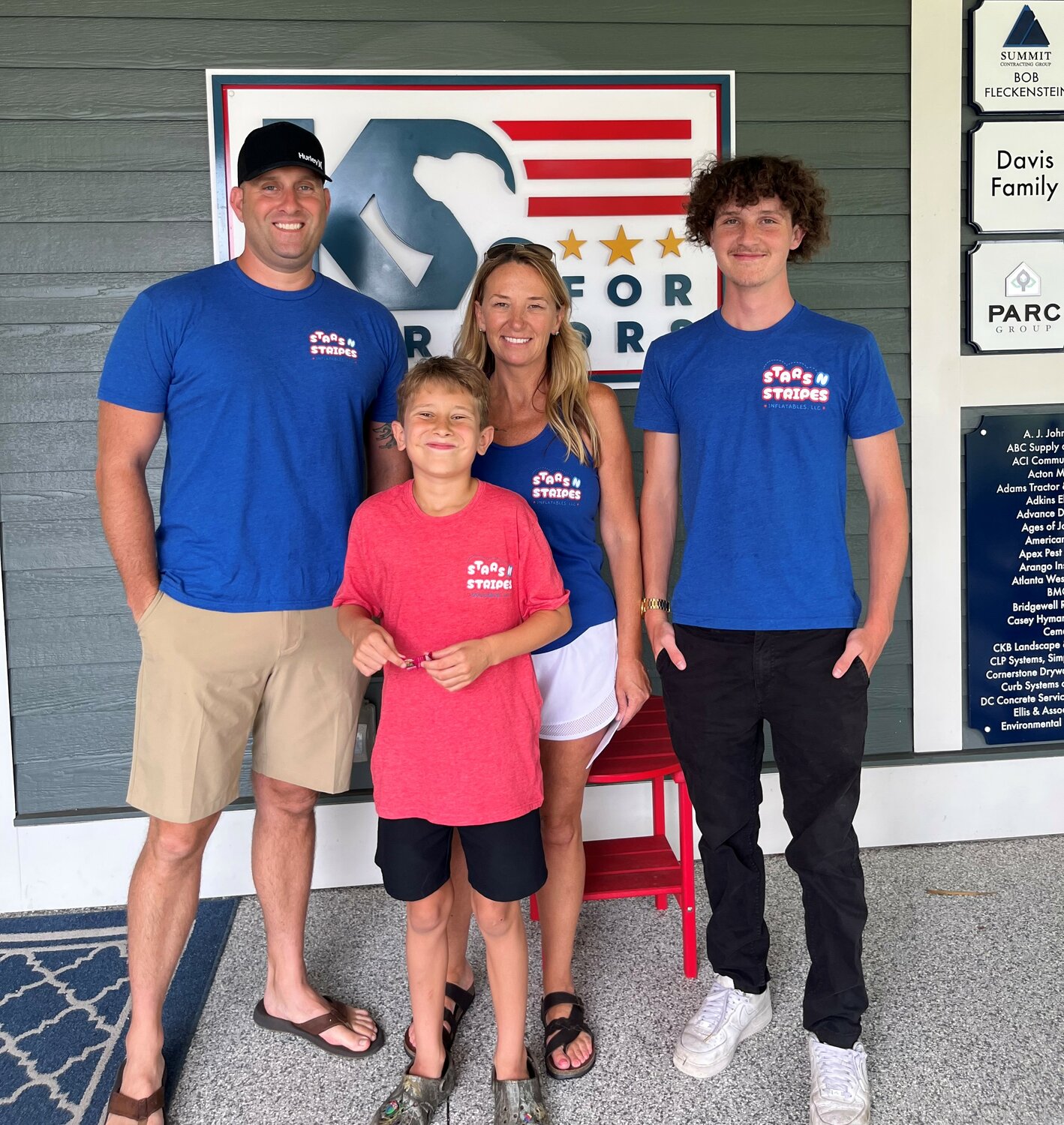 Rogan Drainer and his family at K9s For Warriors where they had just made a donation. Pictured from left are: Adam White, Eli White, Samantha White and Rogan.